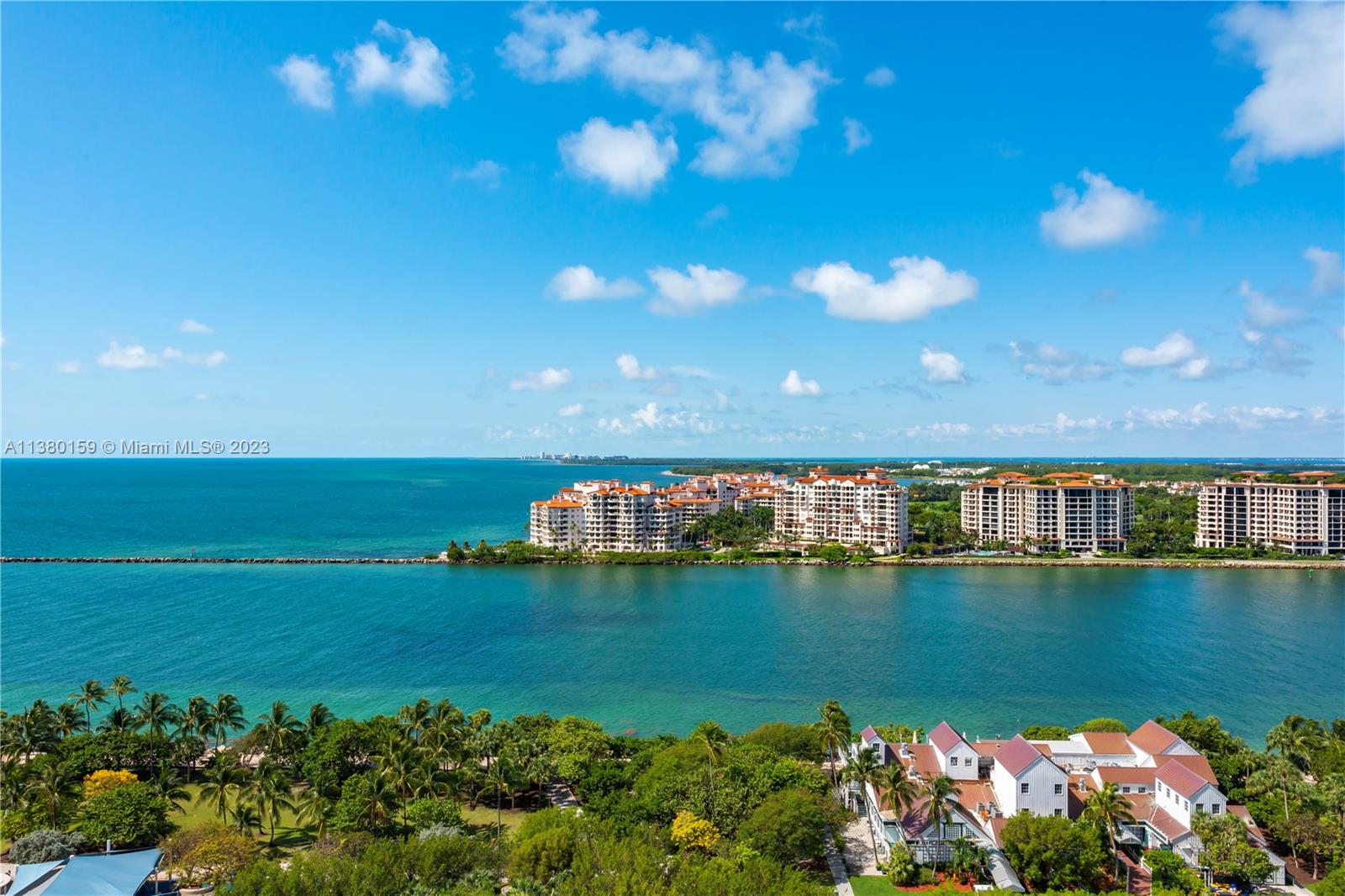 100 South Pointe Drive, Unit 1802 Miami Beach, FL 33139 - Photo 3 of 17 a view of a lake with a building in the background