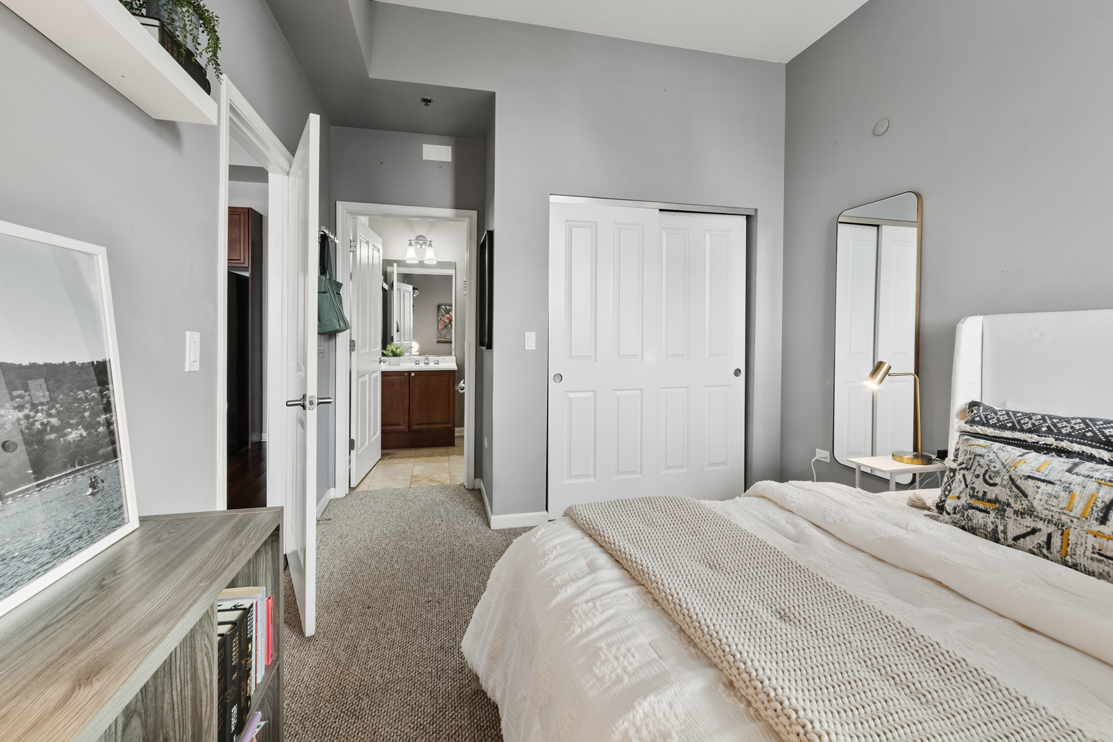 1464 South Michigan Avenue, Unit 1107 Chicago, IL 60605 - Photo 11 of 20 a bedroom with a bed and a flat tv screen