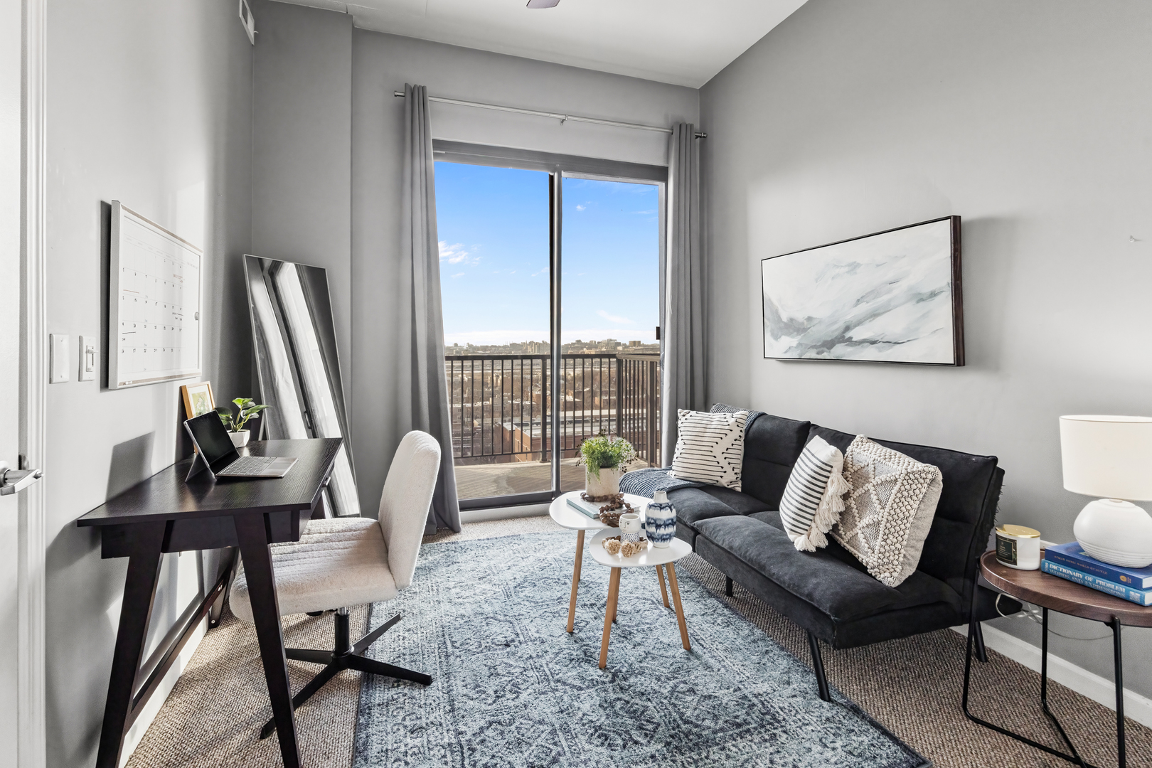 1464 South Michigan Avenue, Unit 1107 Chicago, IL 60605 - Photo 13 of 20 a living room with furniture and a large window
