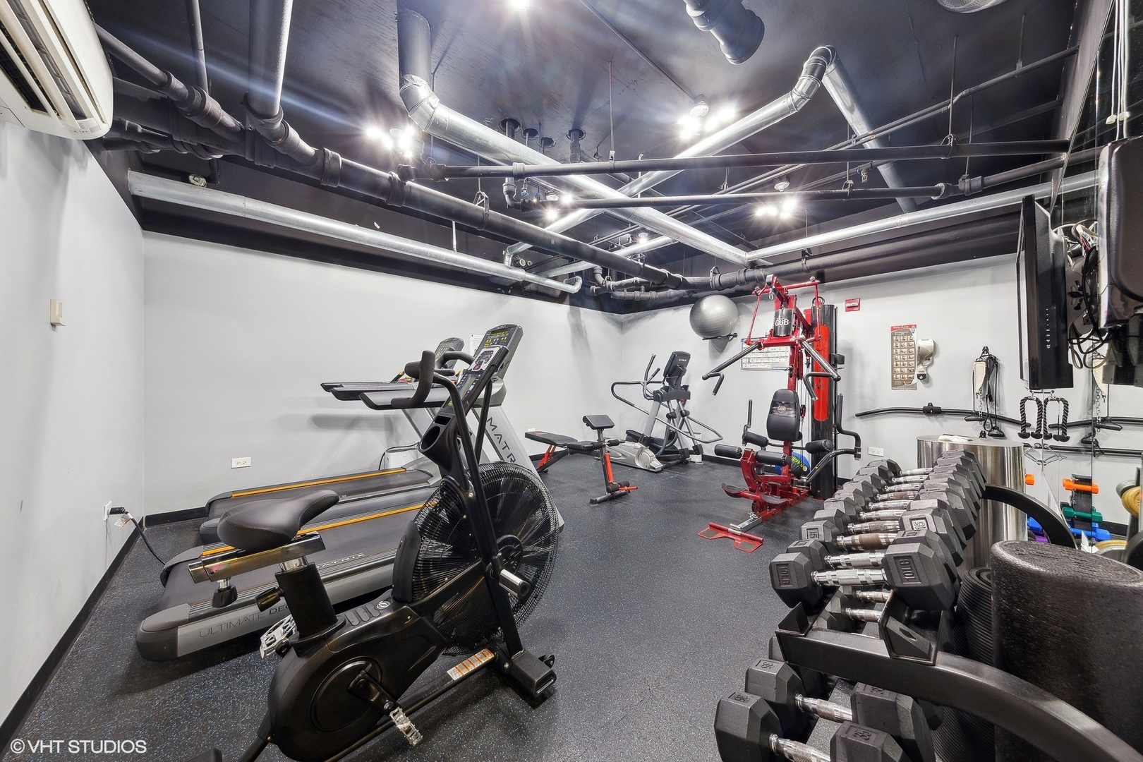 1464 South Michigan Avenue, Unit 1107 Chicago, IL 60605 - Photo 18 of 20 a view of a room with gym equipment