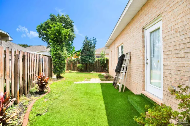 a view of a backyard with a garden