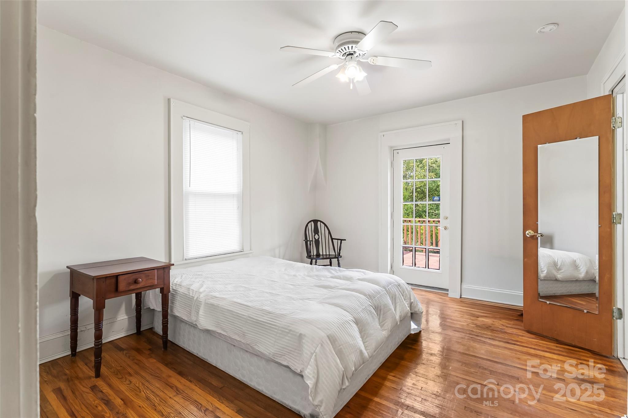 1205 East Union Street Morganton, NC 28655 - Photo 15 of 35 a bedroom with a bed and a table