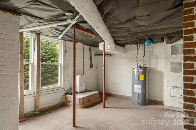 a view of a room with wooden walls