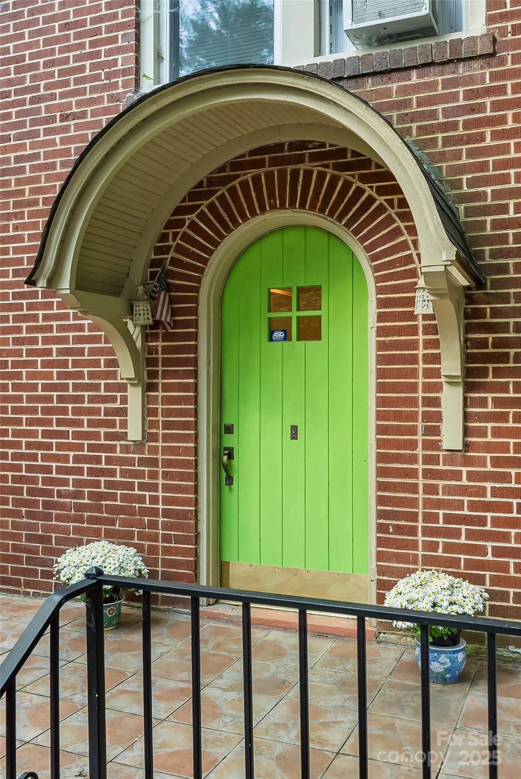 1205 East Union Street Morganton, NC 28655 - Photo 5 of 35 a front view of a house with a garden