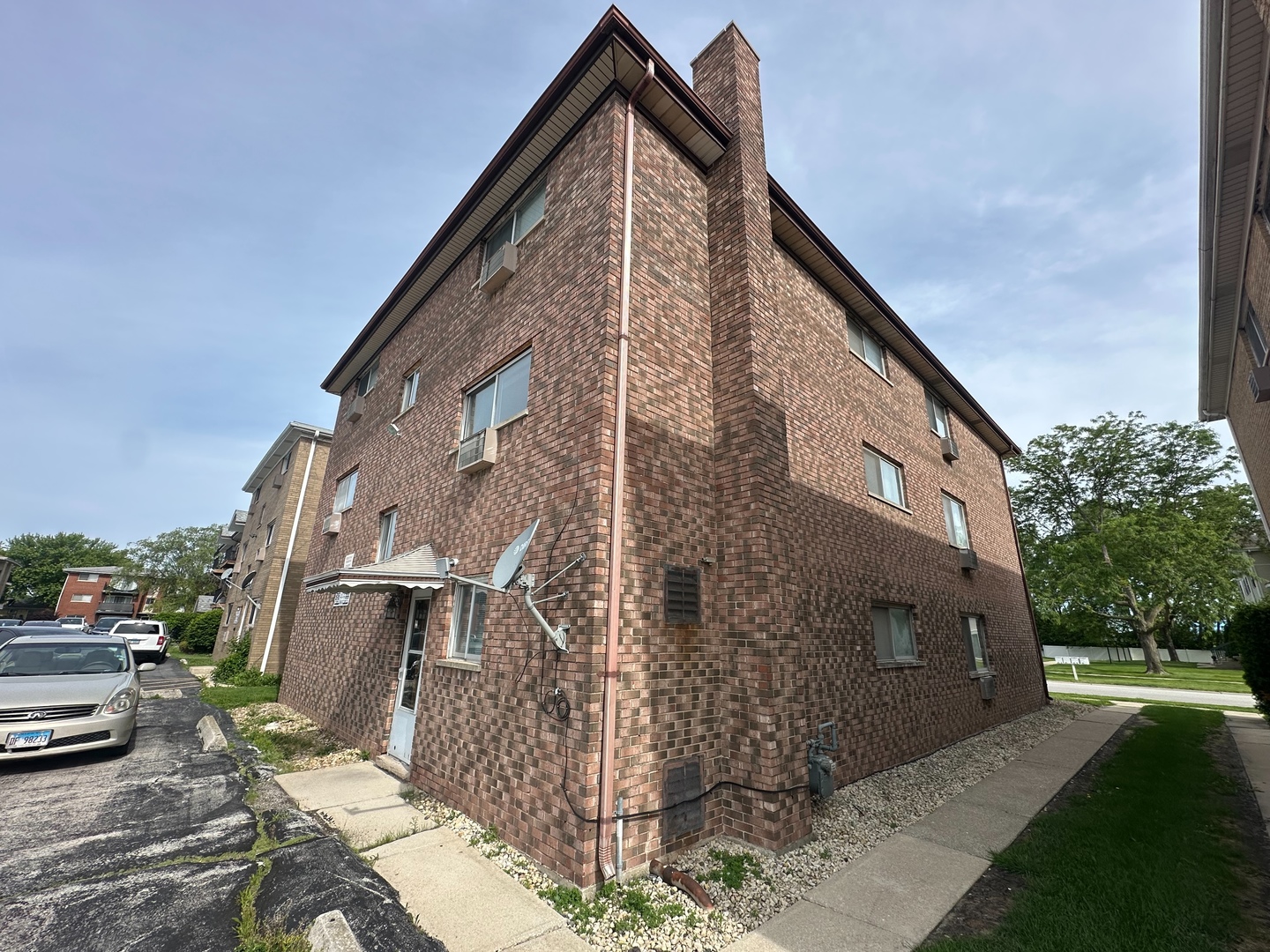 2121 176th Place Lansing, IL 60438 - Photo 6 of 26 a view of a house with a street