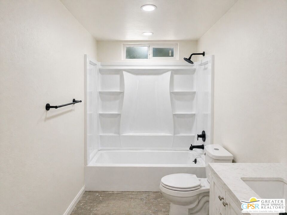 49760 Big Morongo Canyon Road Morongo Valley, CA 92256 - Photo 17 of 47 a bathroom with a toilet and a bathtub