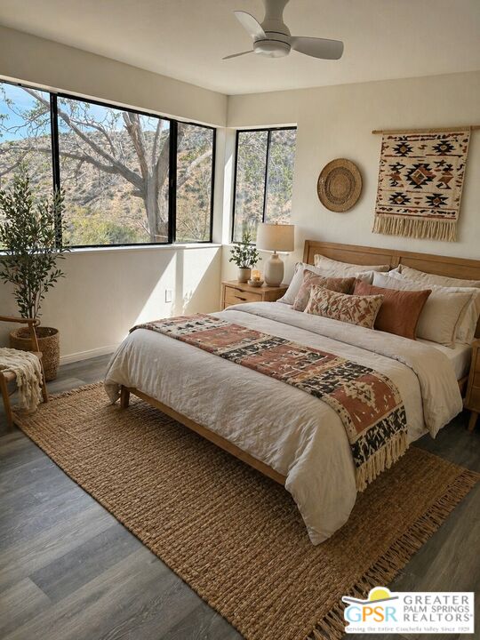 49760 Big Morongo Canyon Road Morongo Valley, CA 92256 - Photo 21 of 47 a bedroom with a bed and a large window