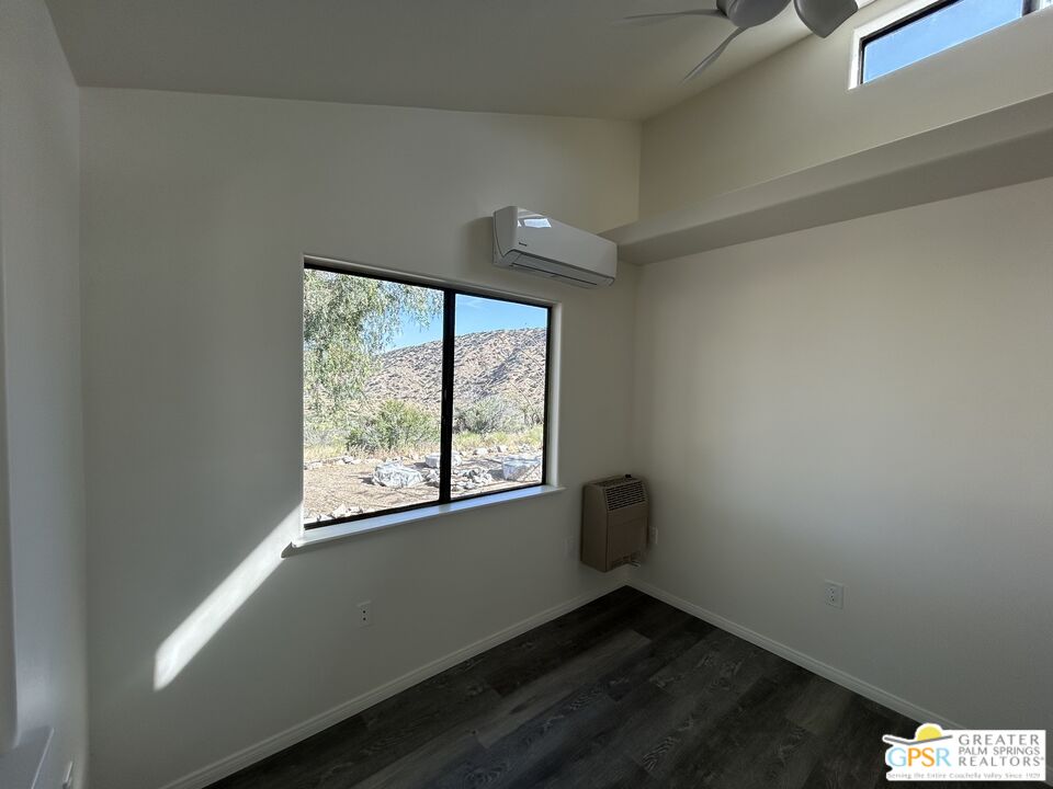 49760 Big Morongo Canyon Road Morongo Valley, CA 92256 - Photo 23 of 47 a view of an empty room with a window