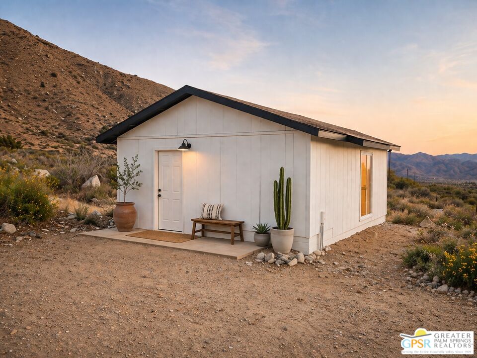 49760 Big Morongo Canyon Road Morongo Valley, CA 92256 - Photo 28 of 47 a view of a house with backyard and bushes