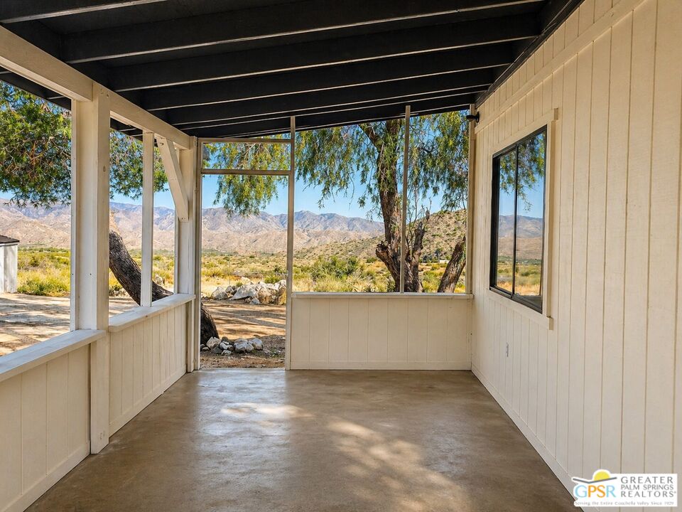 49760 Big Morongo Canyon Road Morongo Valley, CA 92256 - Photo 3 of 47 a view of a porch and garden