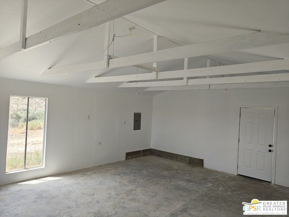 49760 Big Morongo Canyon Road Morongo Valley, CA 92256 - Photo 31 of 47 an empty room with windows