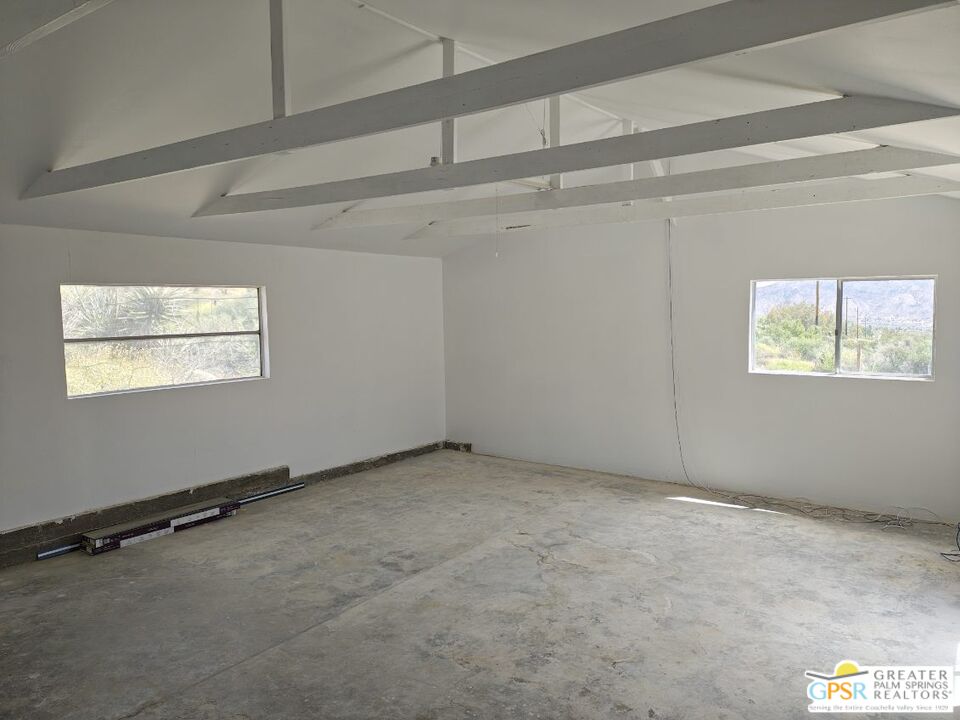 49760 Big Morongo Canyon Road Morongo Valley, CA 92256 - Photo 32 of 47 a view of an empty room with a window