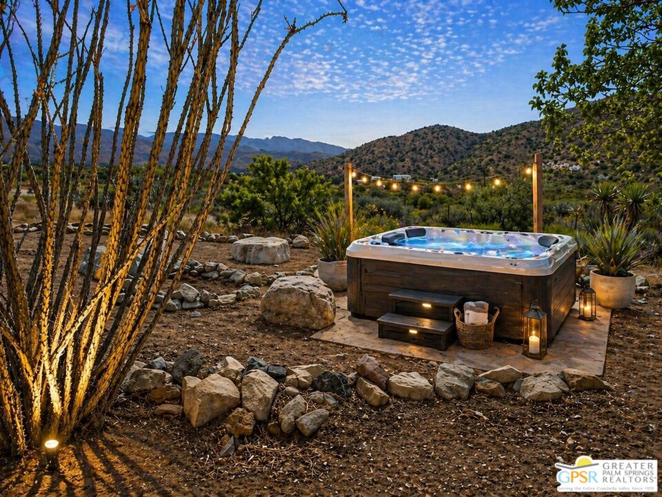 49760 Big Morongo Canyon Road Morongo Valley, CA 92256 - Photo 42 of 47 a view of a terrace with a garden