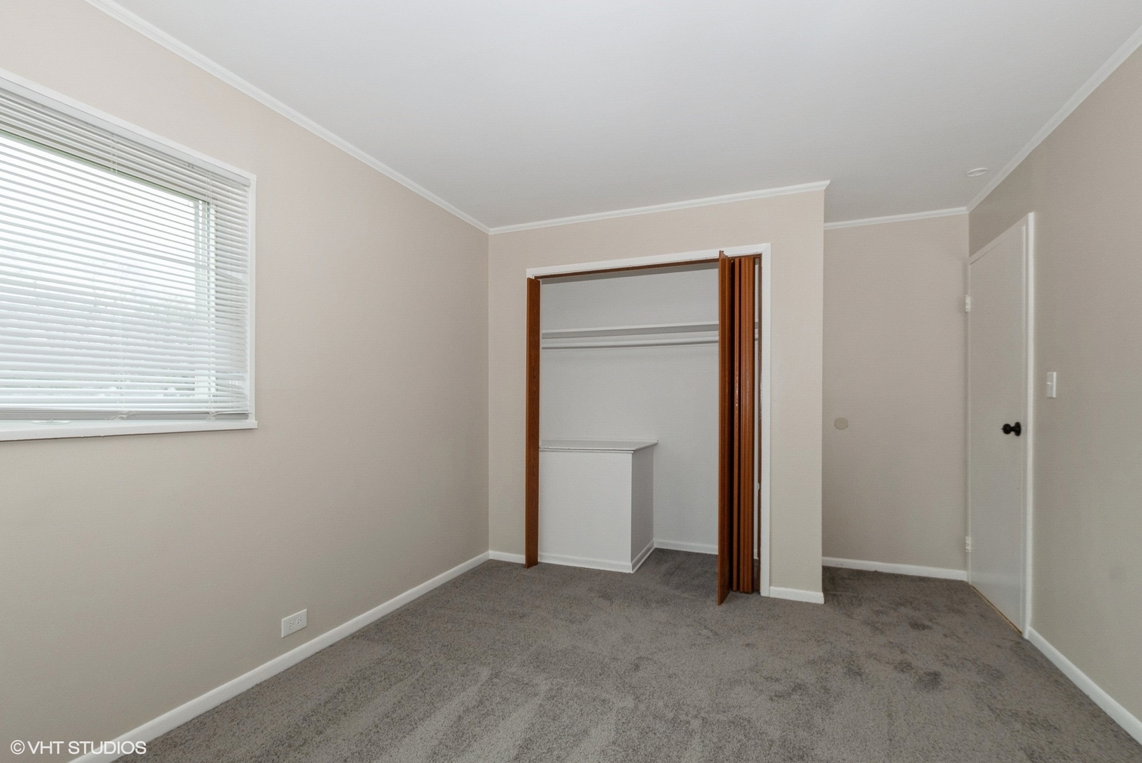 363 Winnebago Street Park Forest, IL 60466 - Photo 6 of 14 a view of an empty room with closet and a window