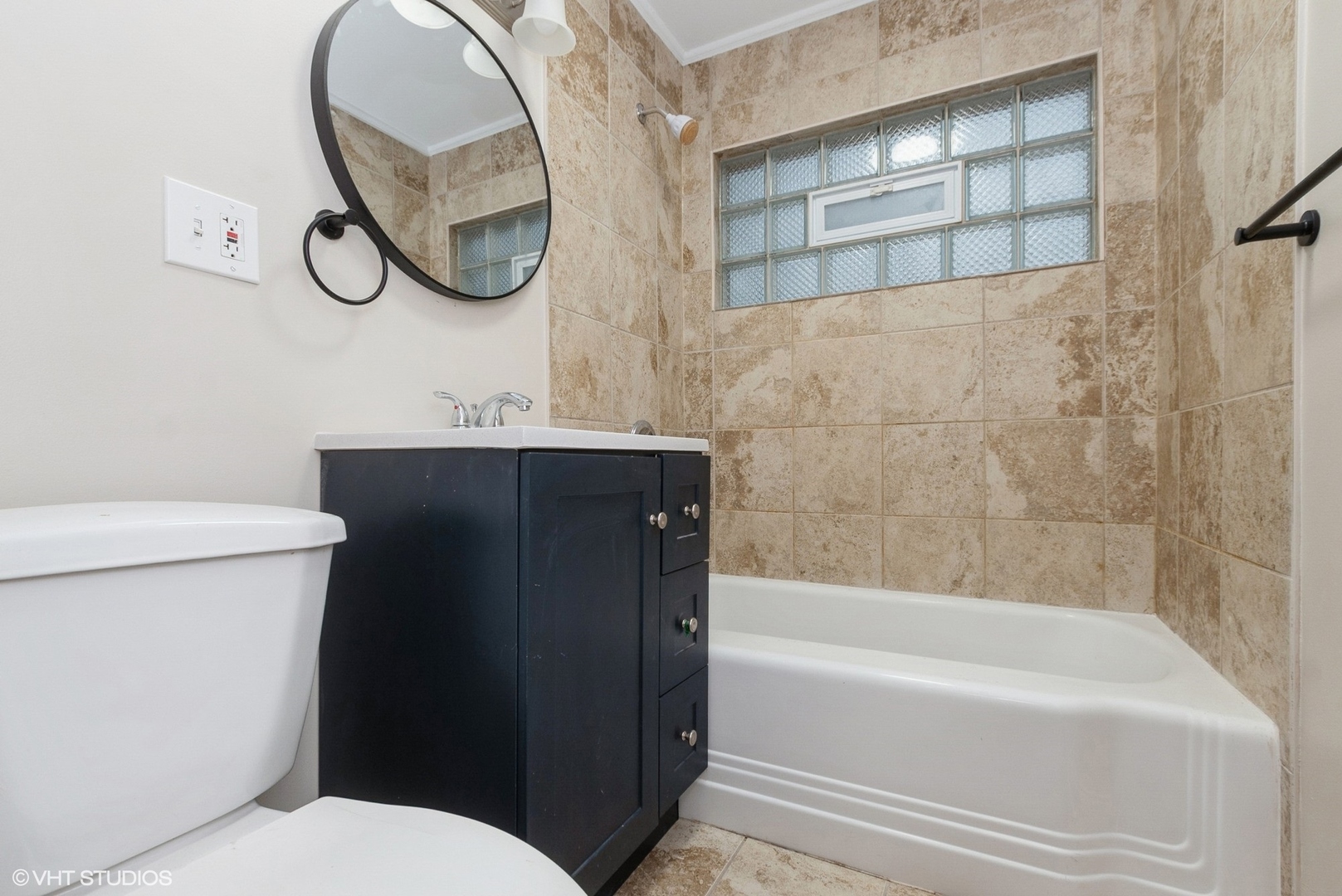 363 Winnebago Street Park Forest, IL 60466 - Photo 9 of 14 a bathroom with a sink and a mirror