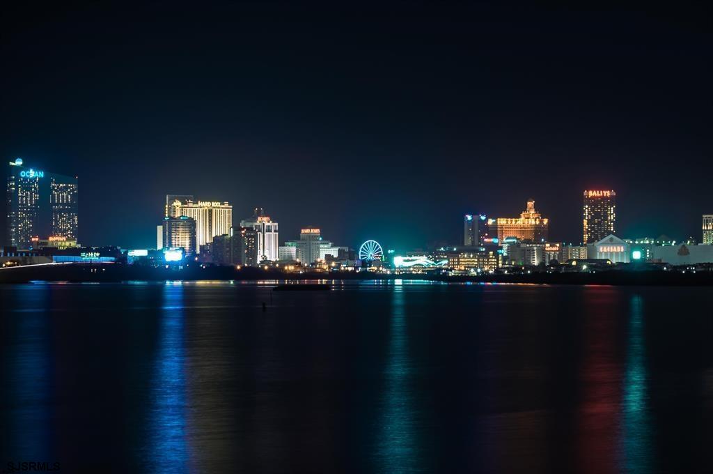 248 Mallard Lane, Unit 248 Egg Harbor Township, NJ 08234 - Photo 18 of 19 a view of a city from a lake