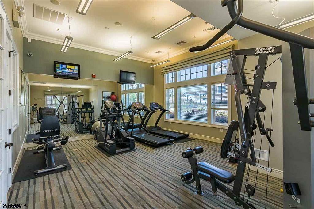 248 Mallard Lane, Unit 248 Egg Harbor Township, NJ 08234 - Photo 10 of 19 a view of a room with gym equipment