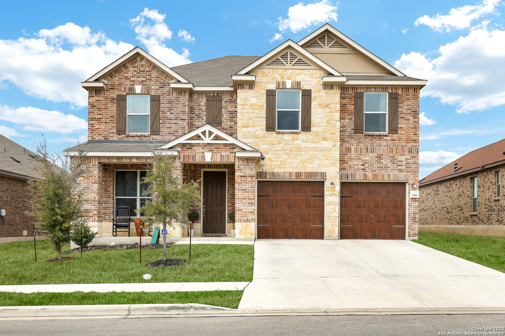 118 Colonial Bluff Universal City, TX 78148 - Photo 1 of 1 a front view of a house with a yard and garage