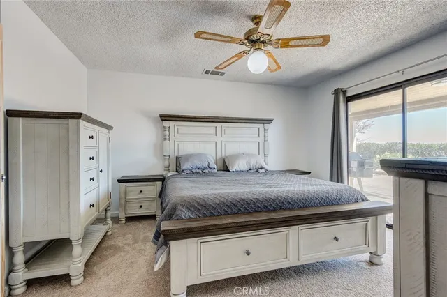 a view of a hallway with workspace and window