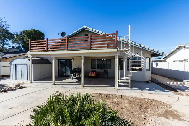 a house view with a outdoor space