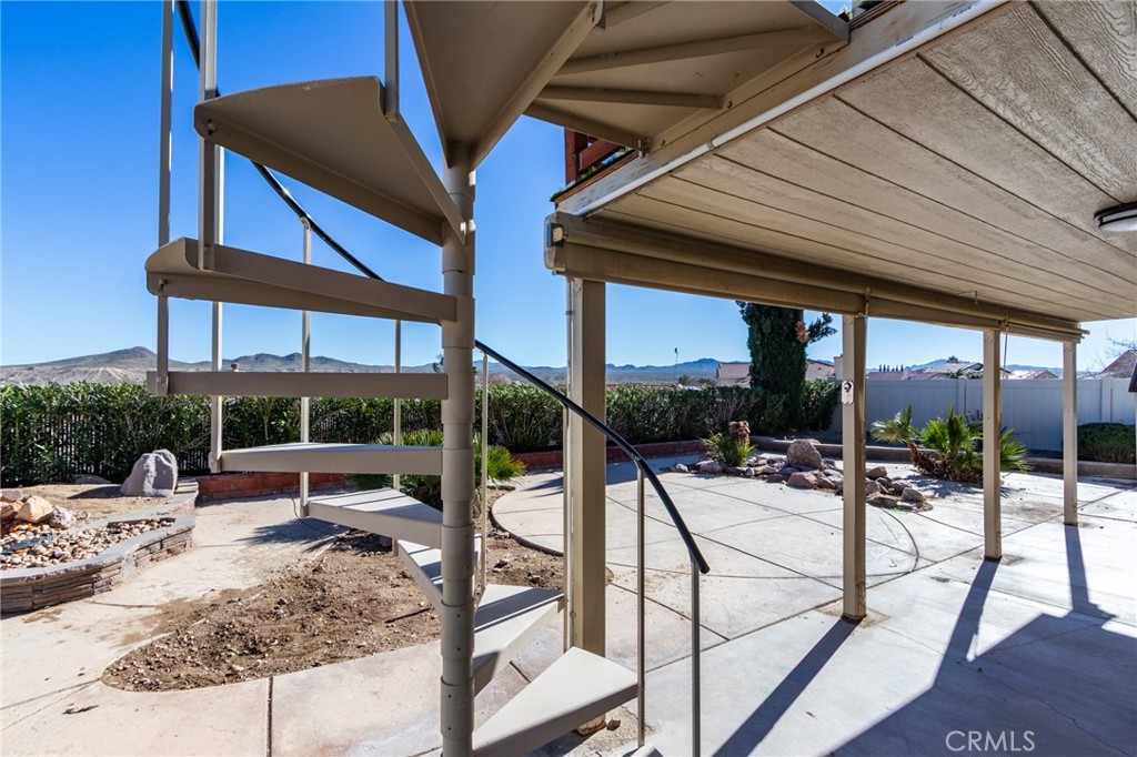 26489 Bluewater Road Helendale, CA 92342 - Photo 44 of 62 a view of a swimming pool with a patio