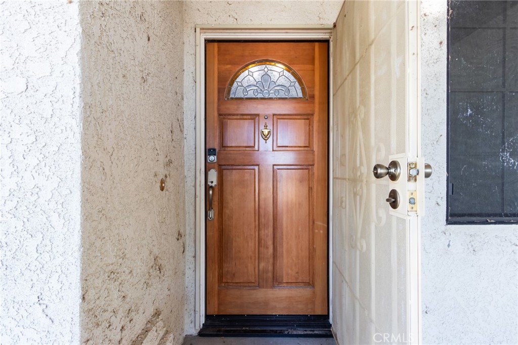 26489 Bluewater Road Helendale, CA 92342 - Photo 8 of 62 a view of a hallway with wooden floor and front door
