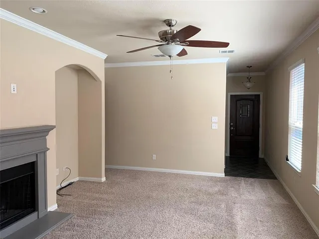 a view of a livingroom with a fireplace