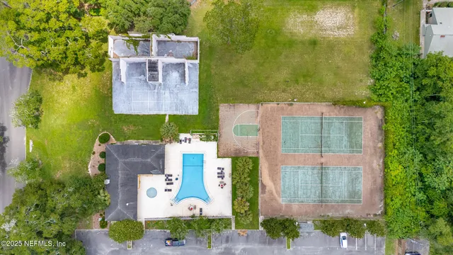 an aerial view of a house with a garden