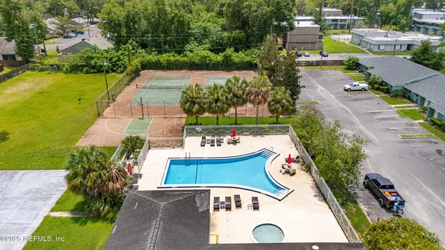 an aerial view of a house with a garden