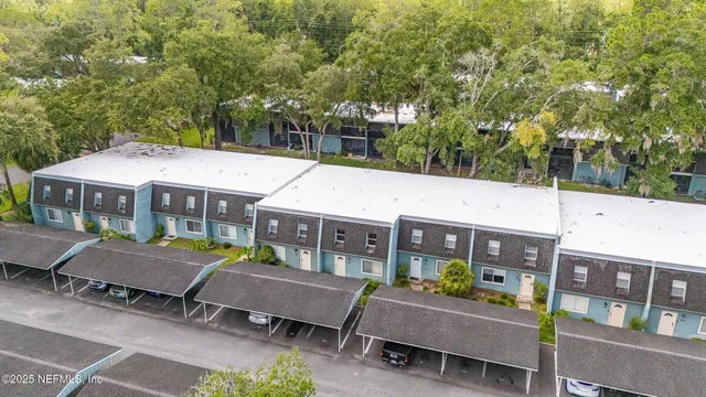 a view of a livingroom with wooden floor
