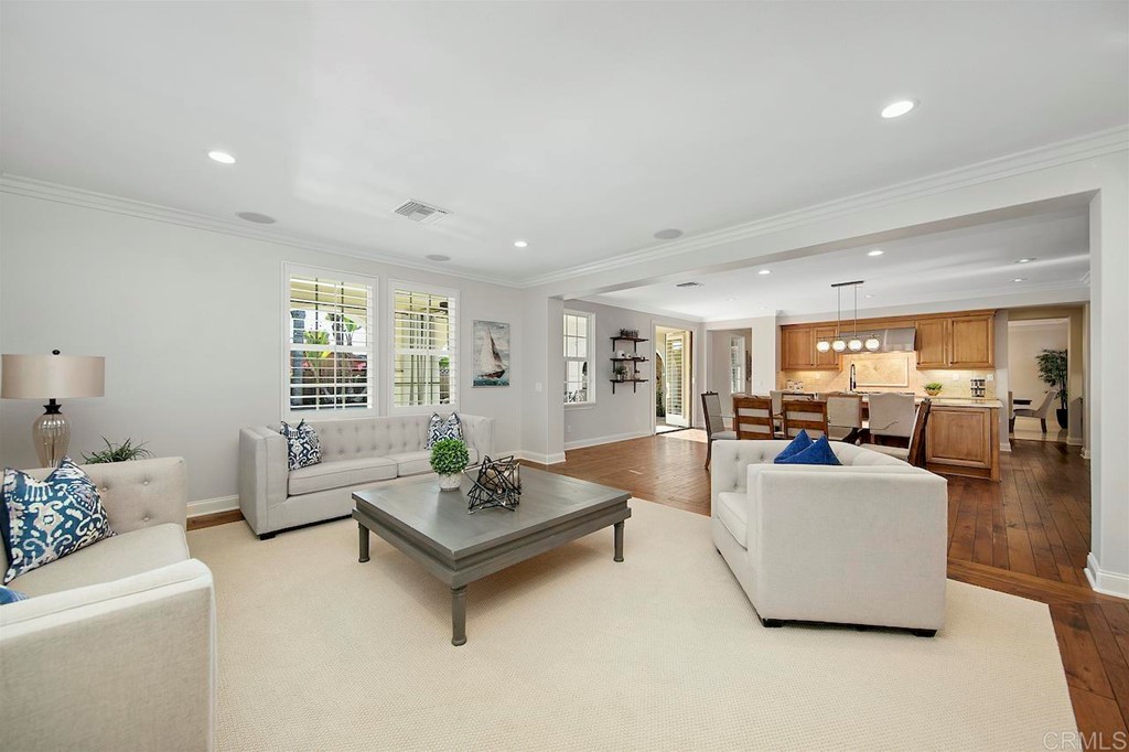 3220 Sitio Montecillo Carlsbad, CA 92009 - Photo 13 of 48 a living room with furniture and a large window