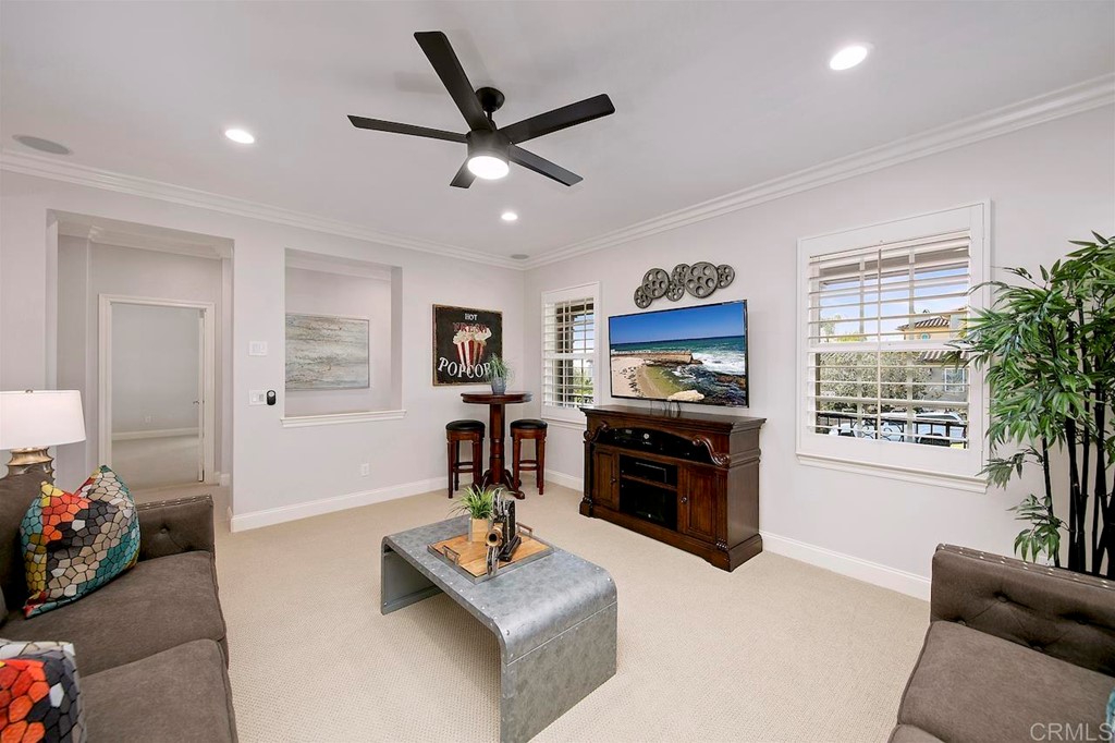 3220 Sitio Montecillo Carlsbad, CA 92009 - Photo 37 of 48 a living room with furniture kitchen view and a window