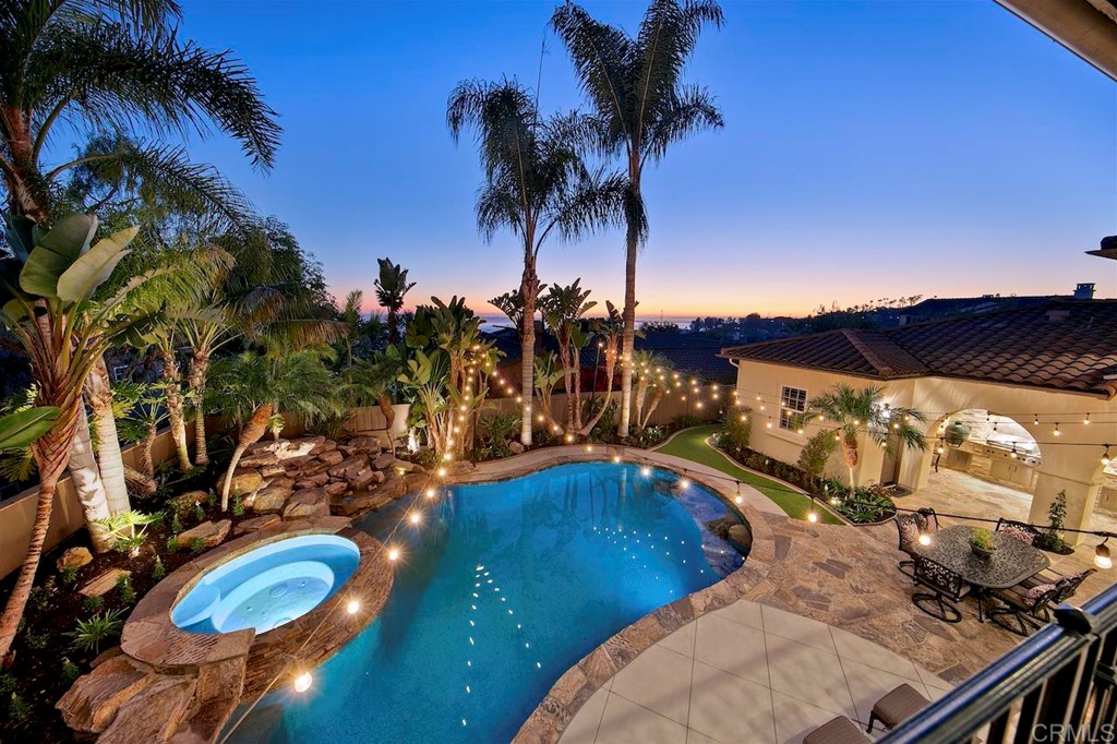 3220 Sitio Montecillo Carlsbad, CA 92009 - Photo 48 of 48 a view of swimming pool with a patio and a yard