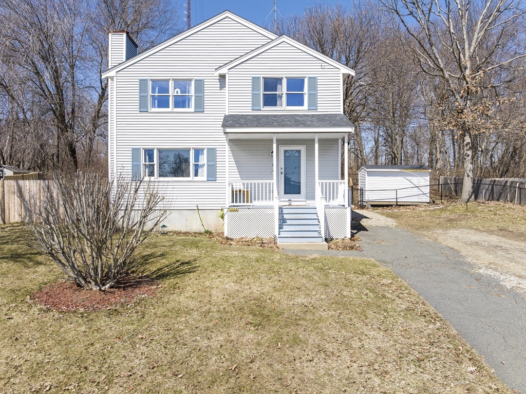 7 Overlook Avenue Haverhill, MA 01832 - Photo 1 of 32 a front view of a house with a yard and garage