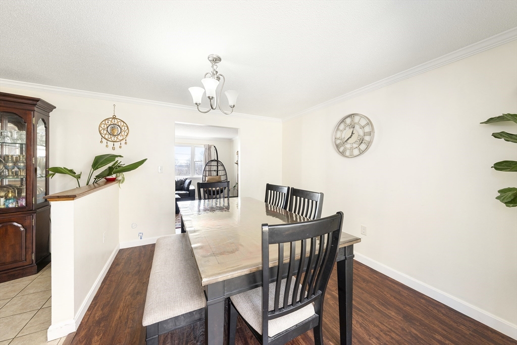 7 Overlook Avenue Haverhill, MA 01832 - Photo 12 of 32 a view of a dining room with furniture and wooden floor
