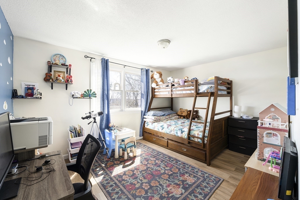 7 Overlook Avenue Haverhill, MA 01832 - Photo 18 of 32 a bedroom with furniture and a wooden floor
