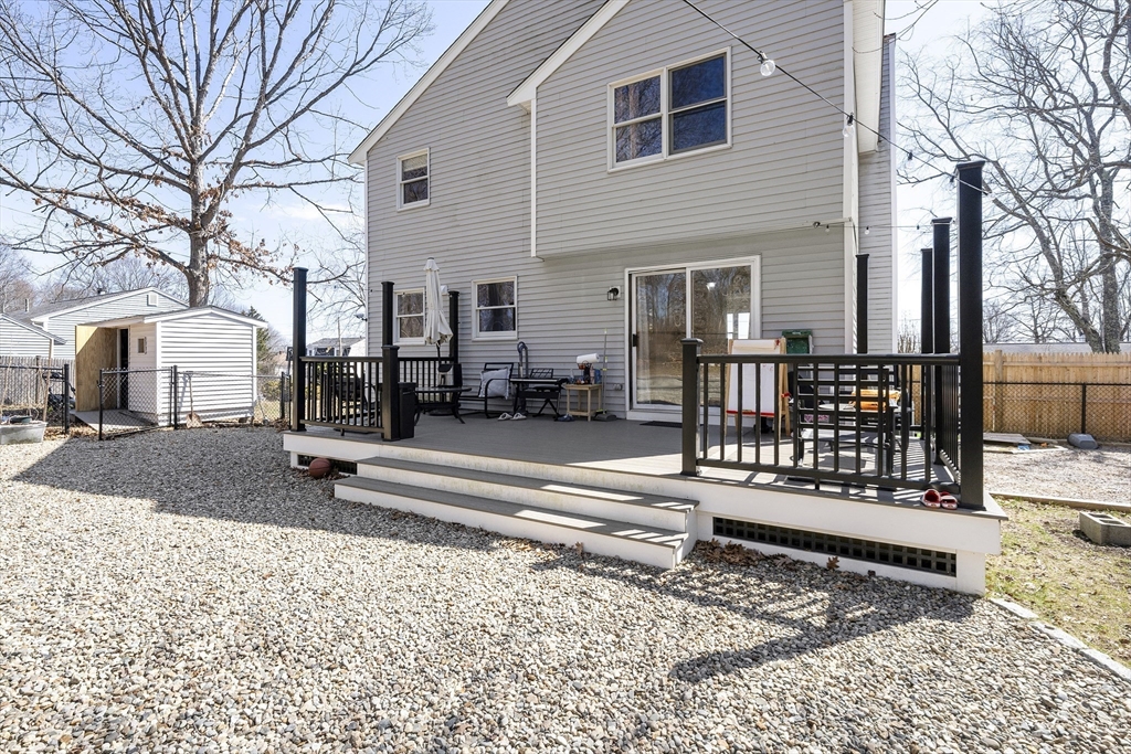 7 Overlook Avenue Haverhill, MA 01832 - Photo 24 of 32 a view of a house with a bench in the patio