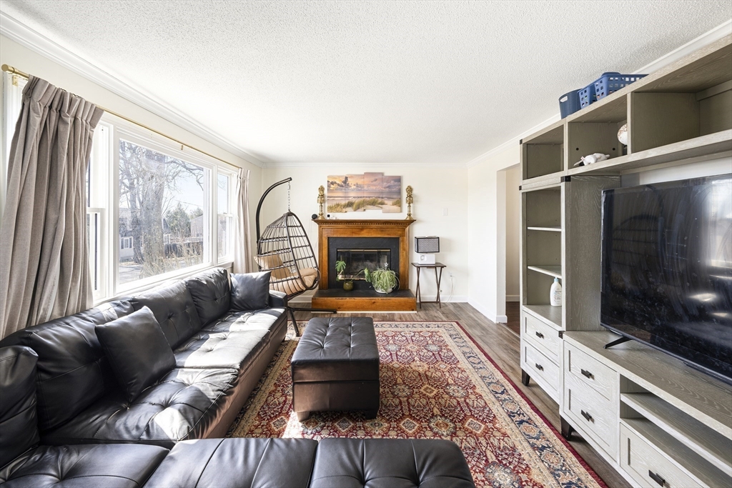 7 Overlook Avenue Haverhill, MA 01832 - Photo 3 of 32 a living room with furniture fireplace and flat screen tv