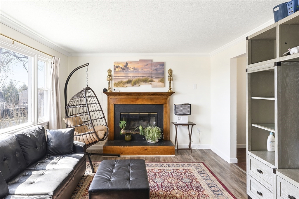 7 Overlook Avenue Haverhill, MA 01832 - Photo 5 of 32 a living room with furniture and a fireplace