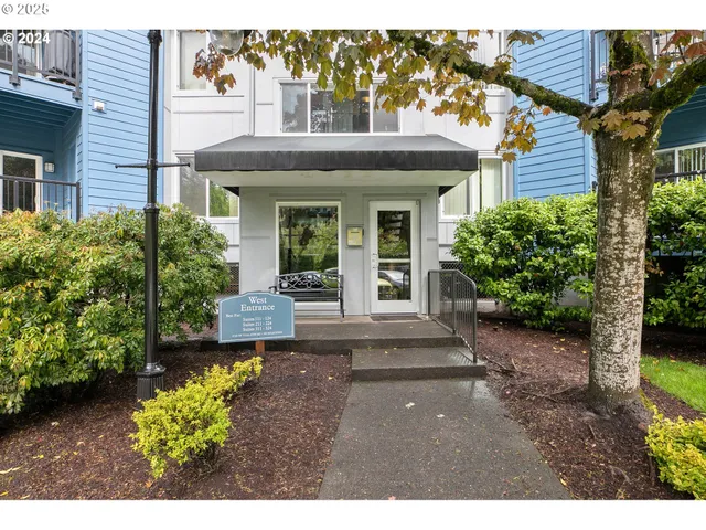 a view of a swimming pool with a lounge chair