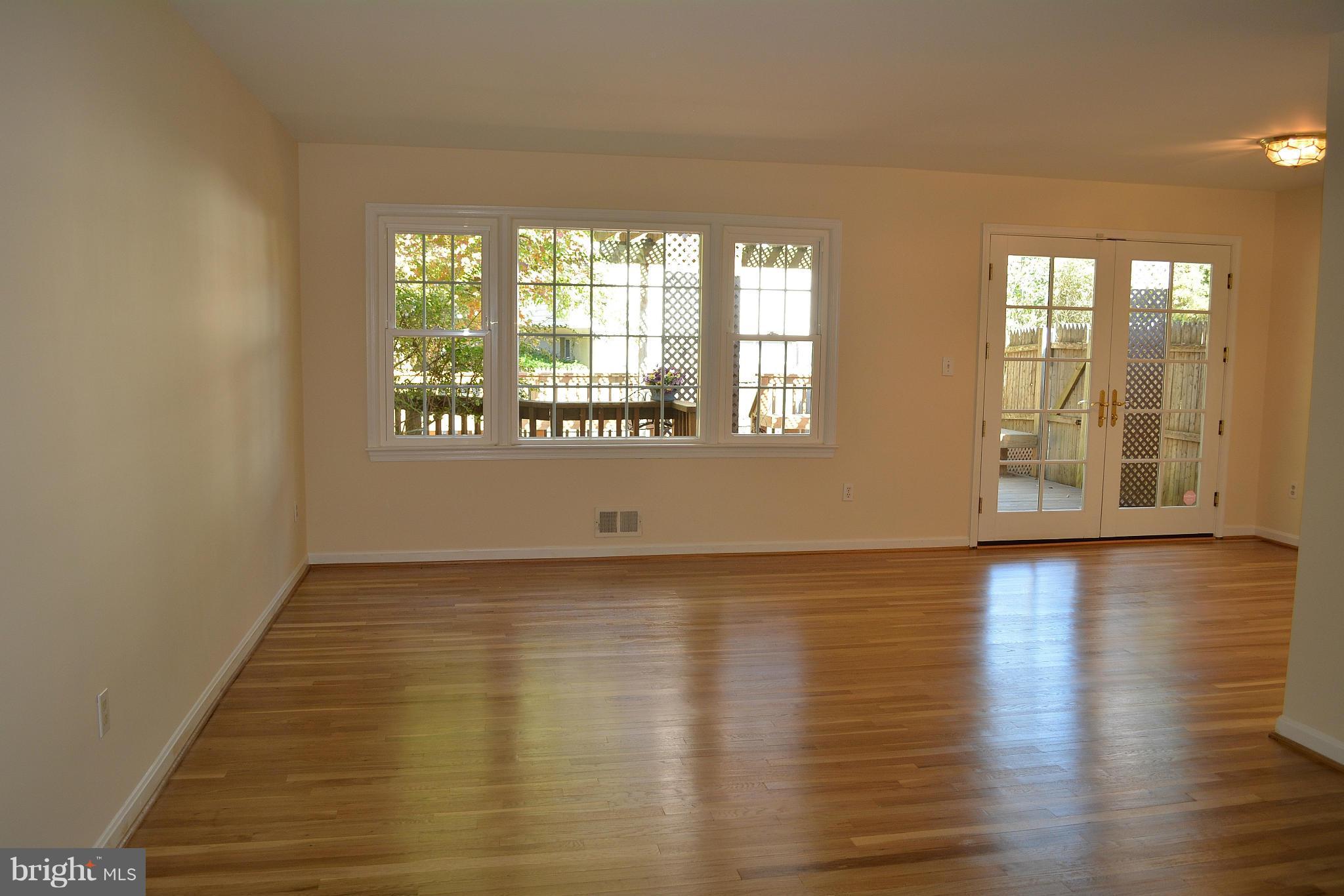 7713 Miller Fall Road Rockville, MD 20855 - Photo 6 of 30 Living Room with pretty wood floors
