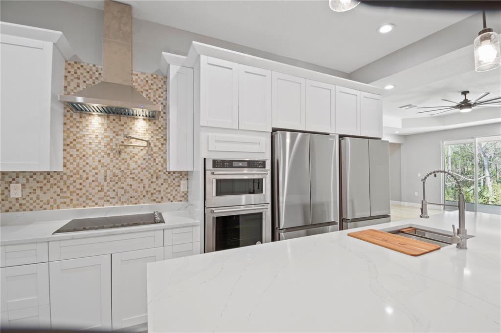 4869 Northwest 101st St Road Ocala, FL 34482 - Photo 11 of 48 Beautiful back splash hood vent