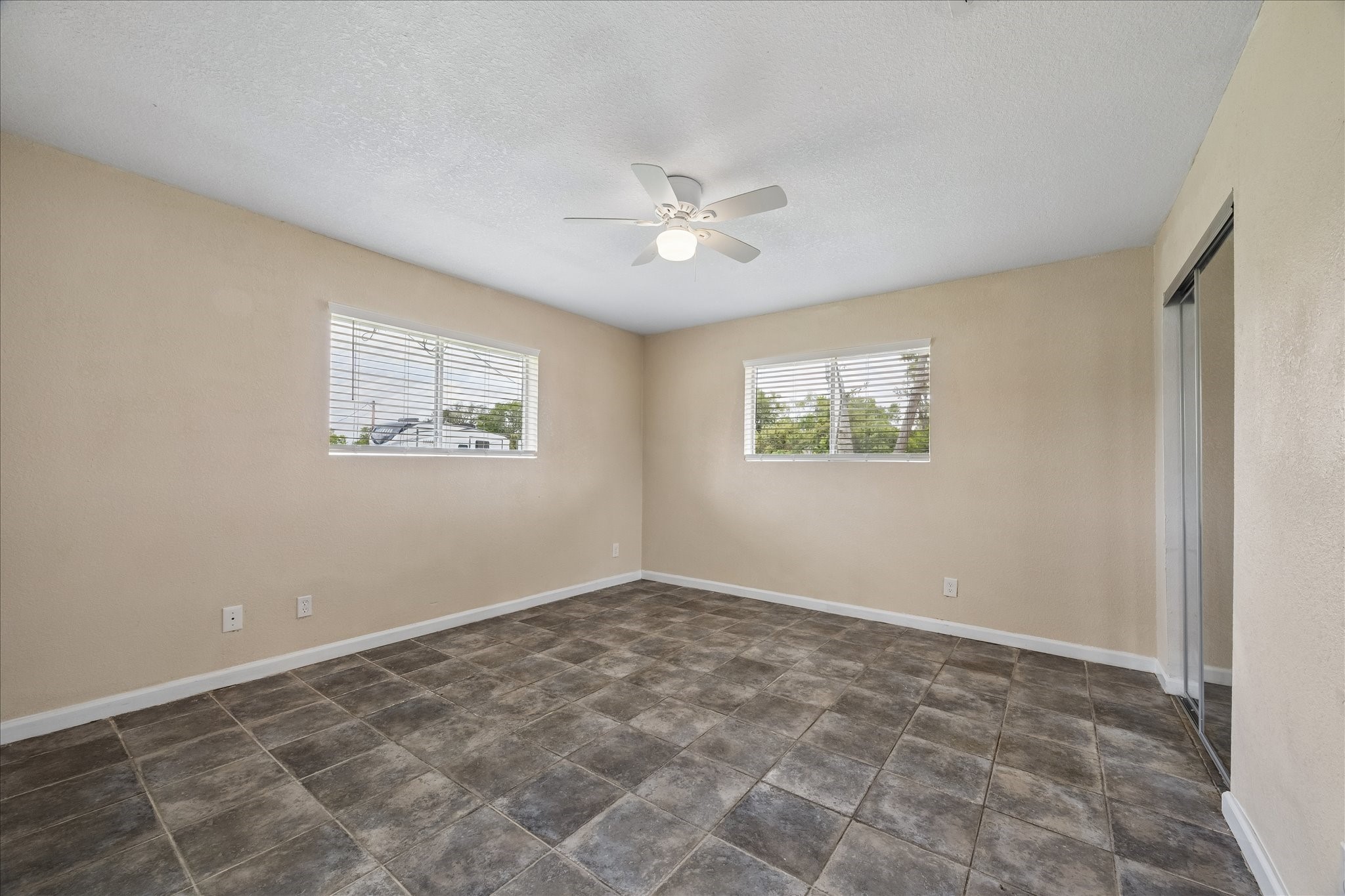 316 Rabbit Trail Lake Jackson, TX 77566 - Photo 11 of 16 a view of an empty room with a window