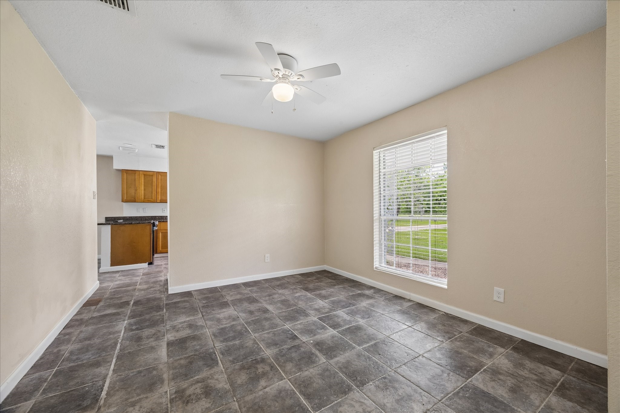 316 Rabbit Trail Lake Jackson, TX 77566 - Photo 10 of 16 a view of an empty room with a window