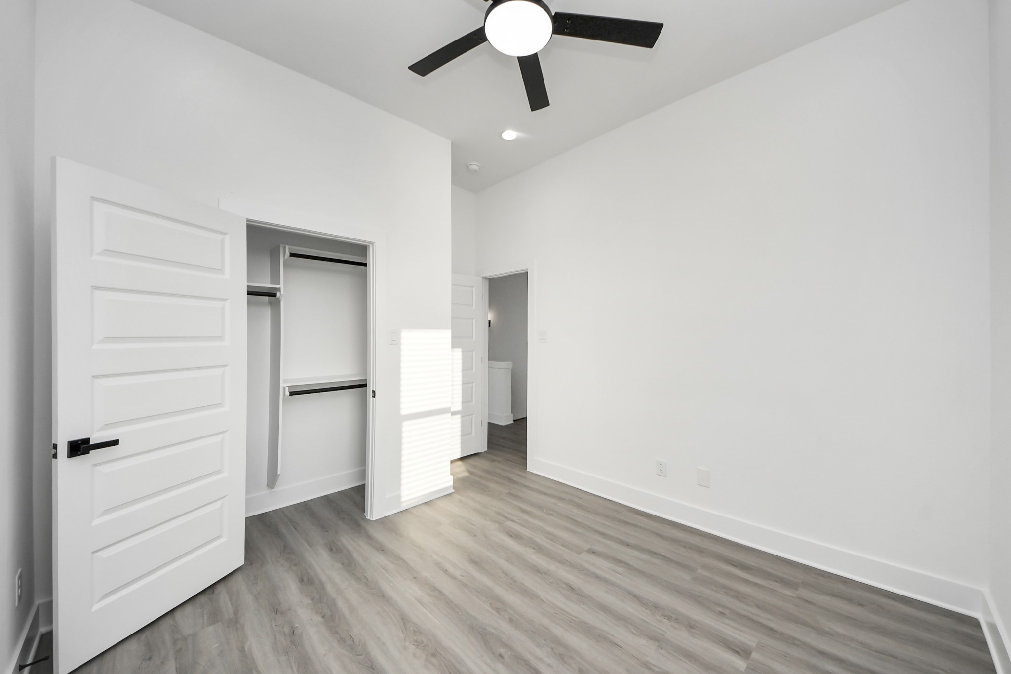 8533 Amadwe Street, Unit A Houston, TX 77051 - Photo 28 of 36 a view of empty room with wooden floor