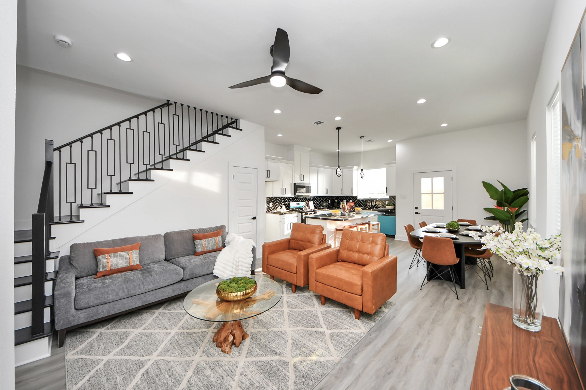 8533 Amadwe Street, Unit A Houston, TX 77051 - Photo 7 of 36 a living room with furniture and a chandelier