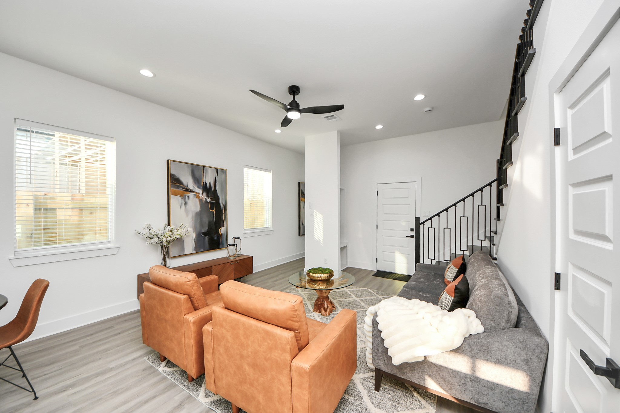 8533 Amadwe Street, Unit A Houston, TX 77051 - Photo 8 of 36 a living room with furniture and a chandelier