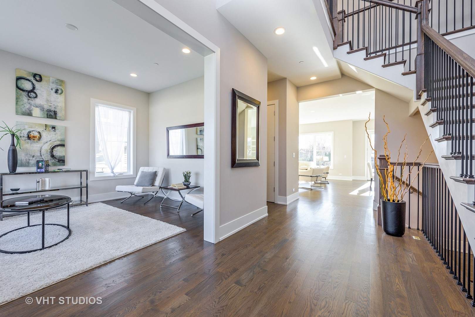 2709 Walters Avenue Northbrook, IL 60062 - Photo 2 of 33 a living room with furniture and a wooden floor
