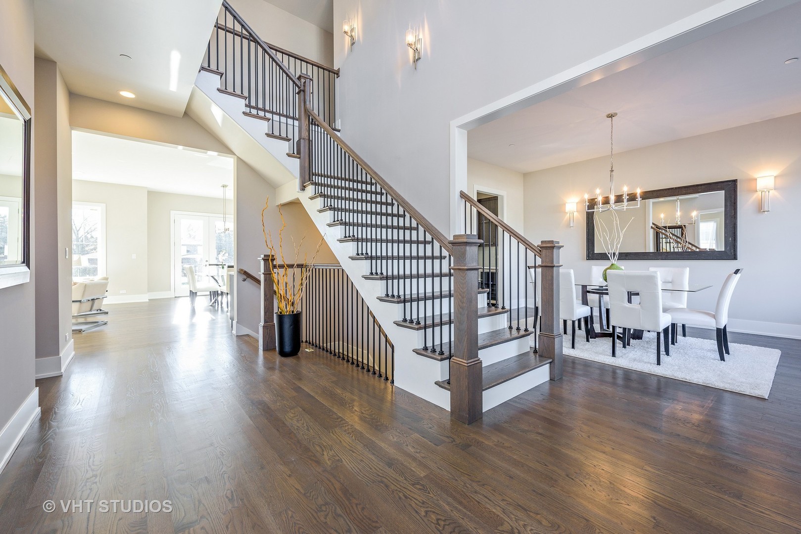 2709 Walters Avenue Northbrook, IL 60062 - Photo 16 of 33 a view of front door with dining room and wooden floor