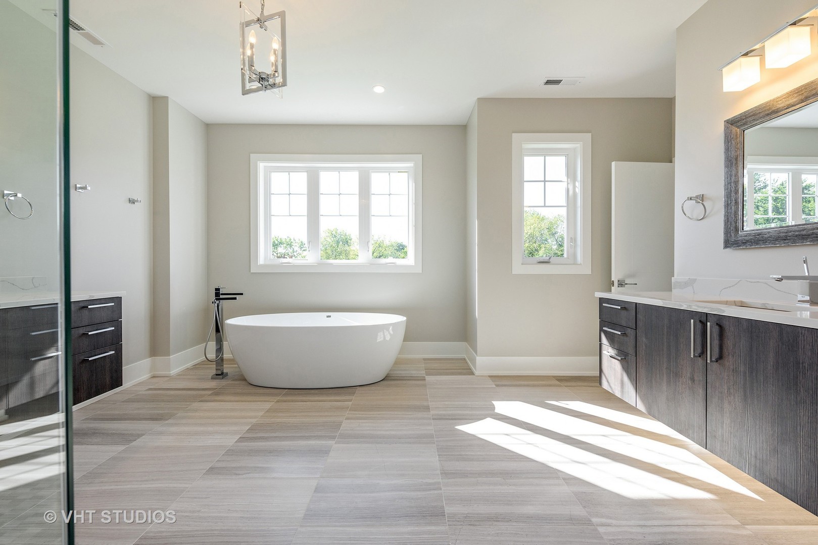2709 Walters Avenue Northbrook, IL 60062 - Photo 21 of 33 a view of an empty room with wooden floor and a window